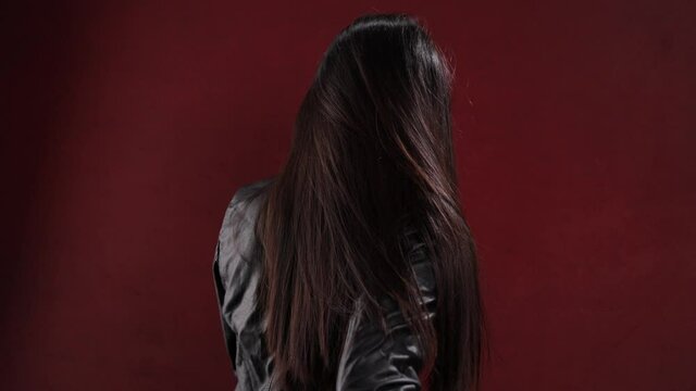 Young beautiful woman with amazing long hair - studio shooting