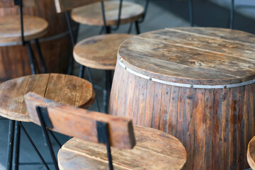 Wine barrels converted to bar tables and chairs, good idea, beautiful design in the restaurant.