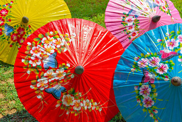 Colourful Handcraft Paper Umbrella at Bo Sang Umbrella Village, One of most famous tourist destination in Chiang Mai, Thailand