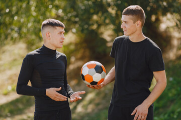 Naklejka premium Spormen is playing football and practising with the ball