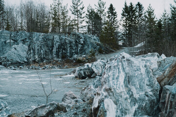Ruskeala Mountain Park - Landmark of Russia. Marble mountain rock quarry winter landscape
