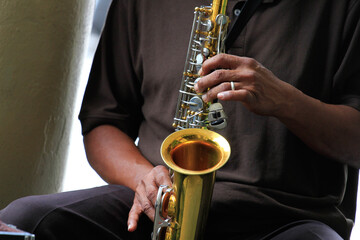 person playing saxophone