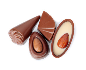Tasty chocolate candies on white background