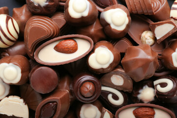 Tasty chocolate candies as background