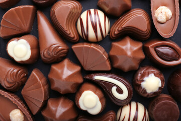 Tasty chocolate candies as background