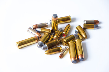 Group of hand gun bullet jhp and lrn fire arm on white background