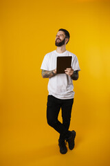 Happy mid aged brunette bearded man