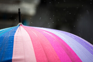 close up umbrella and rain drops