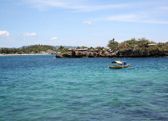 Boracay maritime landscape. Traditional Filipino basrco off the coast of the island of Boracay.