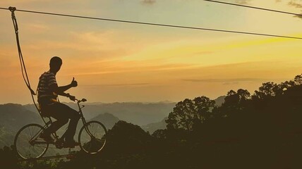 Obraz premium silhouette of a cyclist