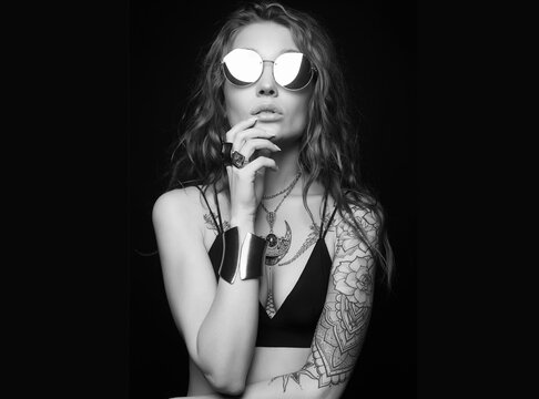 fashion portrait of Beautiful sexy woman with tattoo