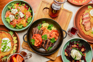 Ukrainian cuisine concept, table covered with traditional food.