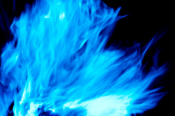 Fototapeta na wymiar An image of a blue flame burning vigorously