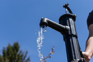  Old water pump outdoors in natural environment