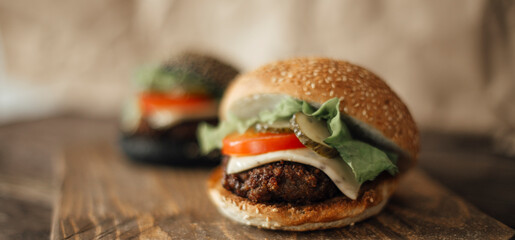 homemade burger on wooden background 