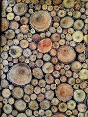 Piles of wood arranged into a motif on a wall decoration