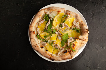 fresh italian pizza on black background