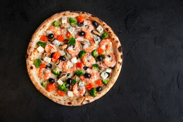 fresh italian pizza on black background