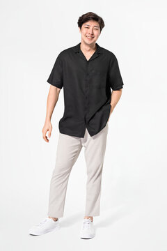 Man in black shirt and pants casual wear fashion full body