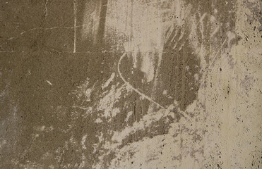 old dirty and rough texture of a wall of cement, scratched and with irregular forms in the background of the surface