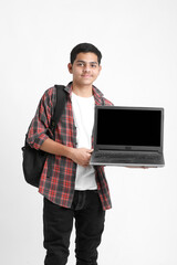 Indian college student showing laptop screen on white background.