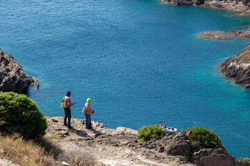 people on the beach a summer day at the playa de pals on the costa brava in girona in the north of spain