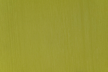 Mustard-colored wood surface texture close-up.Texture or background