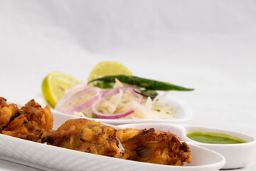 Crispy Indian Street Food With Various Names Like Onion Bhajji Pyaj Pakora Or Pakore Pyaaj Ke Pakode Or Pakoda Kanda Bhaji Pyaaz Bajji Served With Green Chutney And Ketchup Is Tea Time Chaat Snacks
