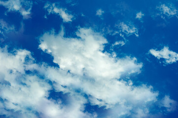 In summer blue sky with clouds in the open air