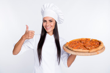 Portrait of attractive positive lady hold pizza show thumb up have good mood isolated on white color background