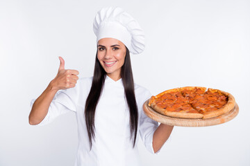 Portrait of attractive positive lady hold pizza show thumb up have good mood isolated on white color background