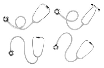 Set with stethoscopes on white background, top view