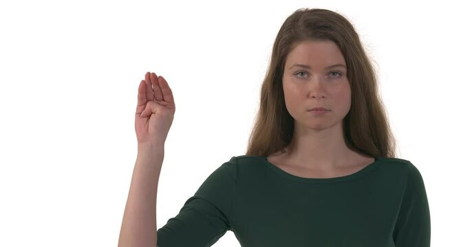 Young Caucasian woman looking at camera and asking for help with hand gesture. Signal for help. Domestic violence. Isolated on white background