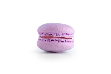 colored fresh macarons in studio on white background