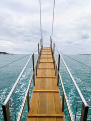 Wooden staircase over the sea