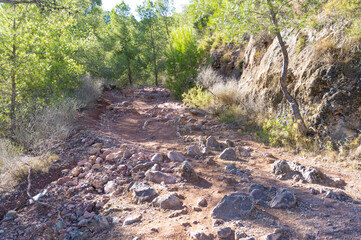 Elevated path with stones in the mountain