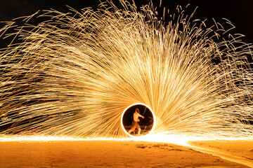 Fire show on the beach at Samed island, Rayong, Thailand.