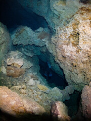Scuba diving in a salactite underwater cave (Cenote Chikin Ha, Playa del Carmen, Quintana Roo, Mexico)