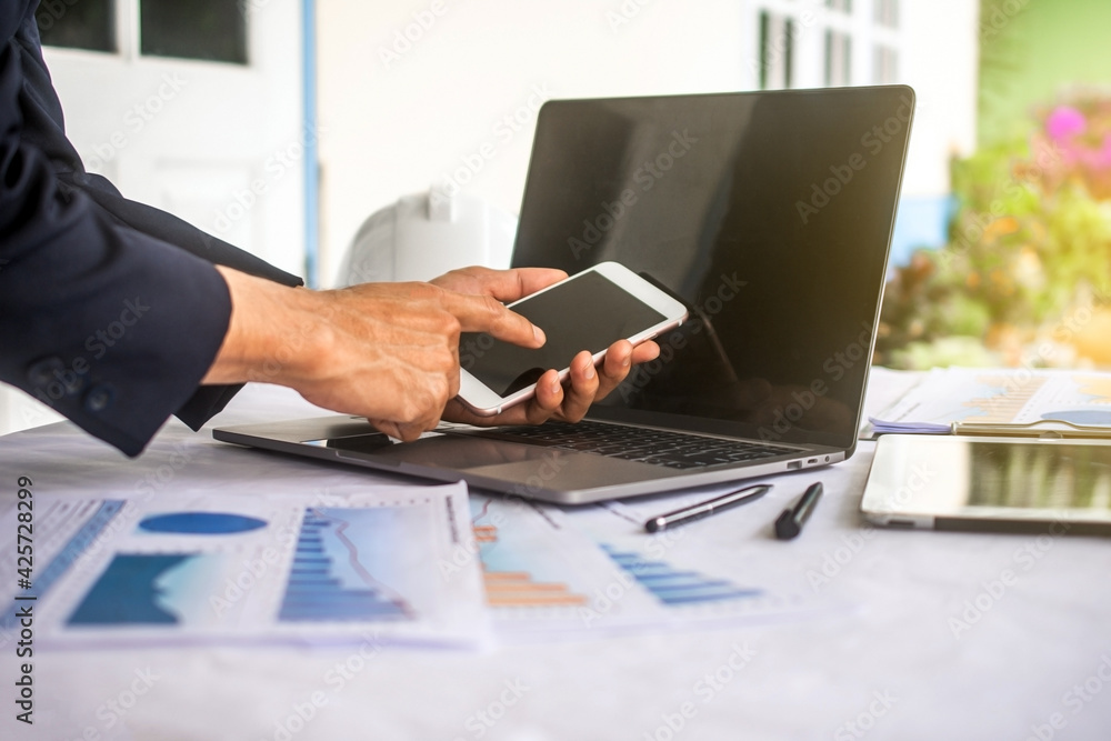 Aufkleber hand using mobile phone in office work ,man using smartphone in work