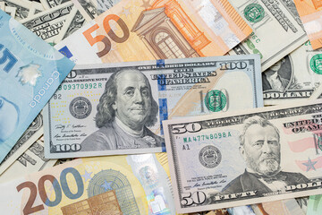 United States dollar, euro and Canadian dollar. Banknotes as Background, Different currencies of the western World. Currency Exchange and Market Trade