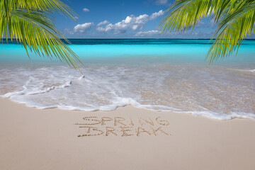 Fototapeta na wymiar Spring Break written on tropical beach.