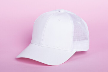 White cap mockup. Blank trucker hat isolated on pink background