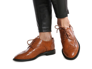 Woman in stylish shoes on white background, closeup