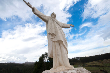 statue of christ the redeemer in mountains of Peru
