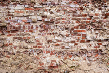 Background from old destroyed red bricks.