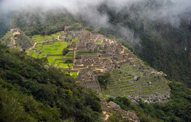 view of full hill with machu picchu country from the top of the hill