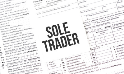 Yellow Paper Note With Words SOLE TRADER , Tax concept