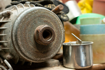 There is a disabled, non-working sharpener on the table.