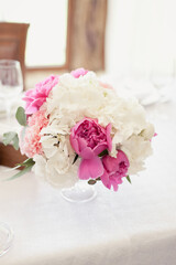 Wedding ceremony decoration in the restaurant. Decoration of wedding table with tender pink textile