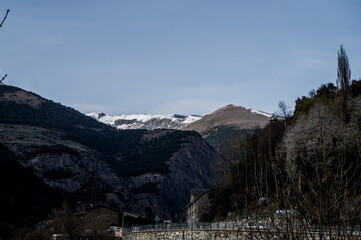 Skyline of mountains in the Pyrenees of Andorra with snowy mountains in the background
